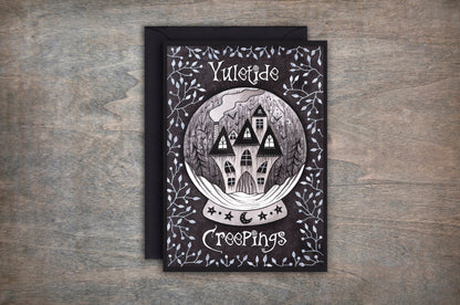 Yuletide Creepings Card - Spooky Snow Globe Haunted House Gothic Winter Card - Black Blue Pagan Yule Alternative Christmas Greetings Card