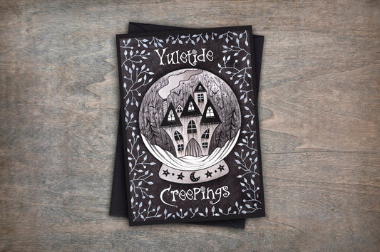 Yuletide Creepings Card - Spooky Snow Globe Haunted House Gothic Winter Card - Black Blue Pagan Yule Alternative Christmas Greetings Card